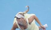 Wozniacki rallies to advance in Beijing