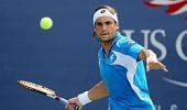 Ferrer thumps local hero Nishikori in Tokyo