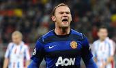 CLeague: Rooney fires United, late Aguero goal seals City win