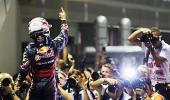 Vettel storms to Singapore win, on verge of re-writing history