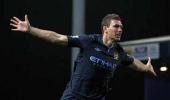 'Frustrated' Dzeko apologises to City teammates