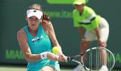 Radwanska upsets Sharapova to win Miami title