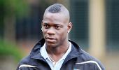 City's Balotelli escapes unhurt from car crash