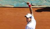 Djokovic switches off from grief to beat Haase