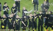 Beer-soaked Dortmund retain Bundesliga title