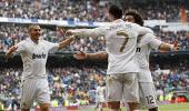 Real beat Sevilla, close in on La Liga title