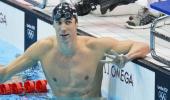 PIX: Phelps sets record with 100m butterfly gold