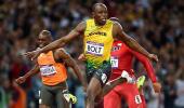 PHOTOS: Brilliant Bolt blazes to Olympic 100m gold