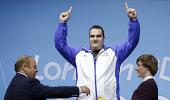Records shatter, champions fall in weightlifting