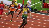 PHOTOS: Bolt does back-to-back sprint double