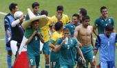 Football: Peralta double helps Mexico shock Brazil