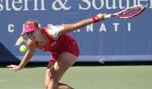 Kerber hands Serena rare loss, advances to semis