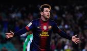 Record-breaking Messi helps Barca to close win over Betis