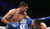 Khan outclasses Molina to register comeback victory