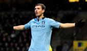 Dzeko inspires Man City as United seal win