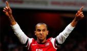 Shades of Henry as Walcott fires Arsenal hat-trick