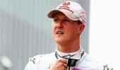 Schumacher plays down title chances