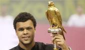 Tsonga beats Monfils to win misty Qatar Open