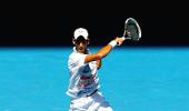 Ice-man Djokovic stays cool in Melbourne heat