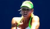 PHOTOS: Easy wins for Djokovic, Sharapova at Aus Open