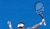 Lion-heart Clijsters overcomes Li Na challenge