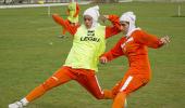 Asia urges green light for headscarves