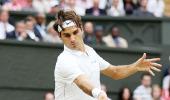 PHOTOS: Federer enters 8th Wimbledon final