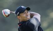 Woods, Mickelson to miss cut; Simpson leads