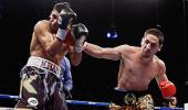 Briton Khan knocked out in fourth round by Garcia