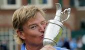 Els wins British Open after late Scott collapse