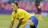 Cristiane is top scorer as flag faux-pas marks Day 1