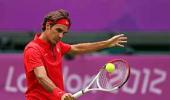 Federer survives first round scare