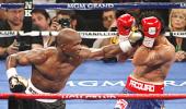 Stunned Pacquiao eyes Bradley revenge