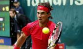 Nadal, Federer win opening matches at Halle Open