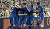 France storm past Ukraine in rain-affected match