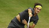 Federer strolls past Youzhny, meets Haas in final