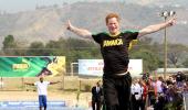 PHOTOS: Prince Harry bolts past Usain