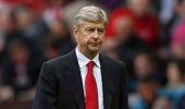 Wenger charged with improper conduct by UEFA