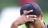 Injured Woods withdraws from WGC