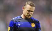 Rooney apologises for breaking young fan's wrist