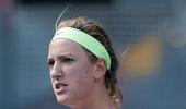 Azarenka, Sharapova advance in Madrid