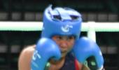 Sarita stuns world champ in quest for Olympic berth