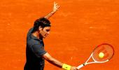 PHOTOS: Federer equals record, Azarenka survives