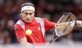 Ferrer clinches first Masters title in Paris