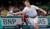 Janowicz polishes off Simon to reach Paris final