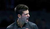 Djokovic fights back to beat Murray at Tour Finals