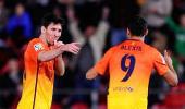 Messi nets twice as shaky Barca beat Mallorca