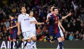 Messi nets another double as Barcelona march on