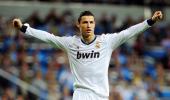 Ronaldo treble lifts Real to 5-1 win over Deportivo