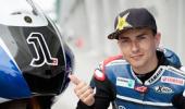 Record lap puts Lorenzo on pole in Malaysia